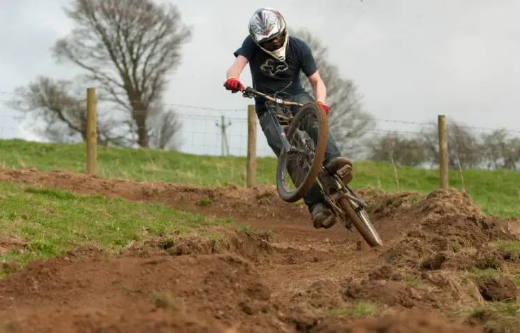 Tim getting all moto out of a berm