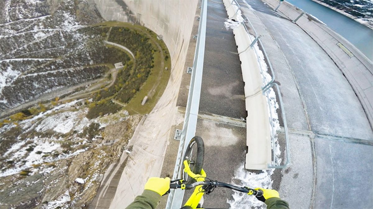 Watch: Riding on the edge of a 200m high dam