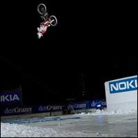 Andreu Lacondeguy: first mountain biker ever to attempt a backflip on a snow big air ramp - Second Image