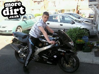 me sitting on my brothers motorbike :)