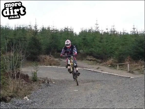Scott impressively manuals a fast tight bend after