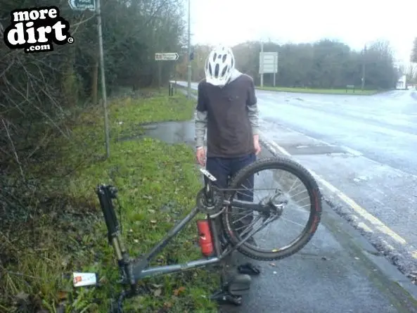 fixing a puncture...on a wet one.