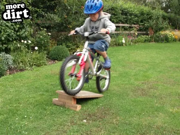 My son trying out his new bike. Put your tongue in