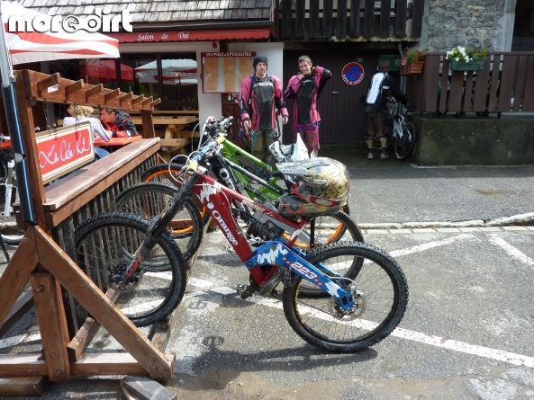 A couple of likly lads in discrete gear considerin