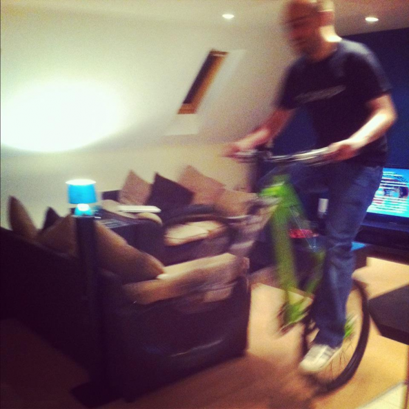 Standup Wheelie in living room. 