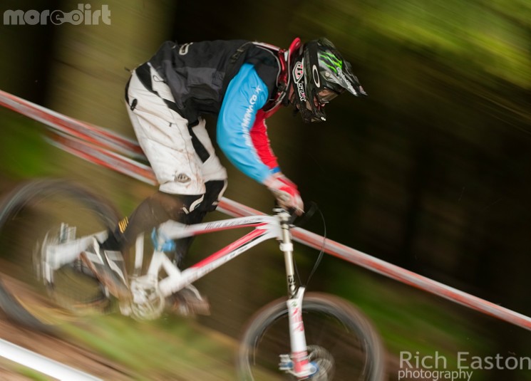 Bike working hard through the rock garden 
