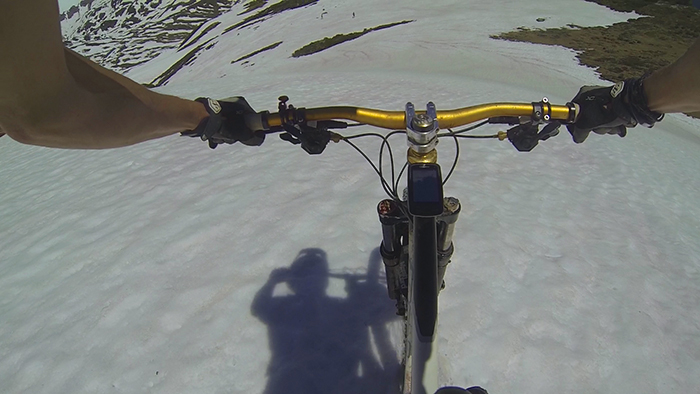 Snow riding on swiss alps summit.